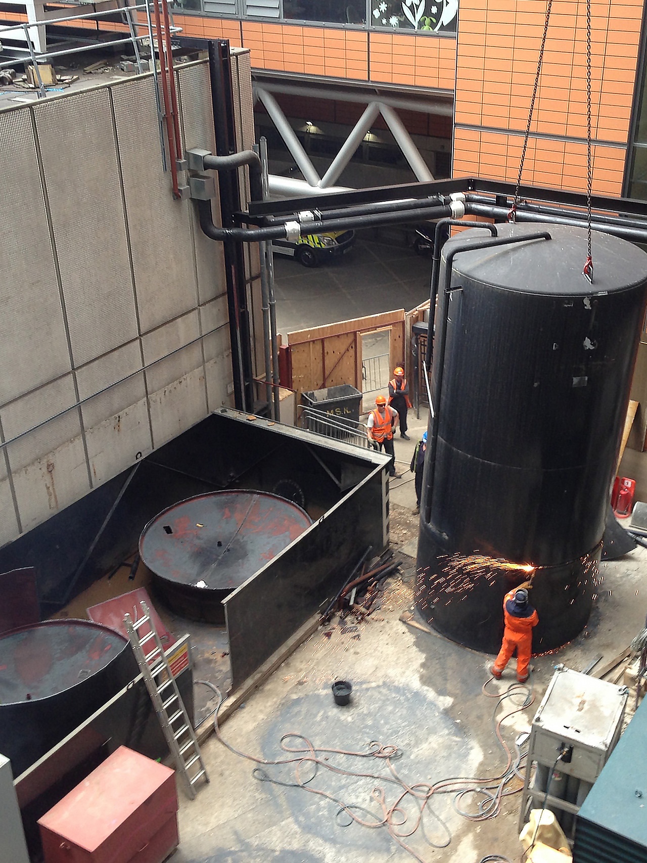 Pic of the 1st Industrial team working on a tank decommissioning job at a London Hospital